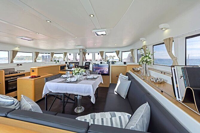 5 Hour Private Day or Sunset Cruise in Large & Majestic Catamaran - Getting on board at Ornos Bay (and why it matters)