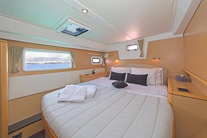 5 Hour Private Day or Sunset Cruise in Large & Majestic Catamaran - Rinia island coves: the “go” stop when the weather cooperates