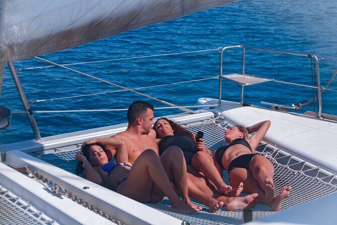 Catamaran cruise in Mykonos with Meal, Drinks & Transport - Rhenia’s cove: swim and snorkel time without the hassle