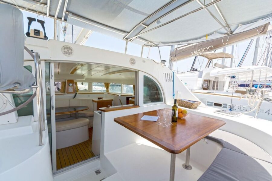 Mykonos: Catamaran Cruise With Meal and Drinks - Lunch and drinks: traditional meal at sea, plus unlimited wine