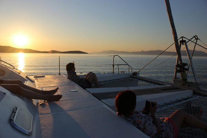 Mykonos Catamaran Private Sunset Cruise, Full Meal & Open-Bar - The first swim stop on Rhenia: where snorkeling turns into a real break