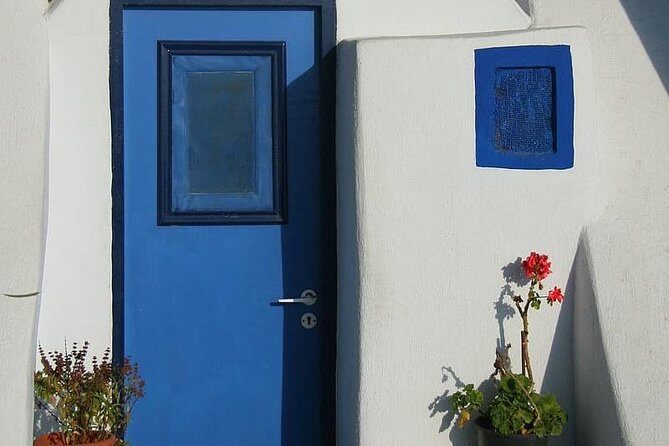 Mykonos Shore Excursion: Private Old Town Walking Tour - Manto Mavrogenous Square: a war heroine meets island tourism
