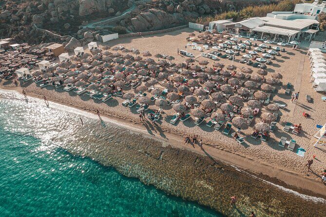 Super Paradise Beach Mykonos Seaside Sunbed (1st row) - Daytime calm vs music later: timing can make the day